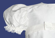 Paradise gown ”Blue feresi-kirtle with small flower pattern in cotton, and white cotton blouse”.