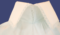Linteum-collection grey Paradisegown in linen, available also in variety white shades in linen, silk and cotton. Collar and cuffs have hand embroidered details. Suitable for both sexes