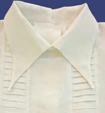 Linteum-collection Shoulder part detail from linen dress show the structure patterns in fabric and linen border lace.